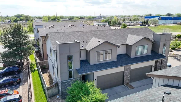 a aerial view of a house with a big yard