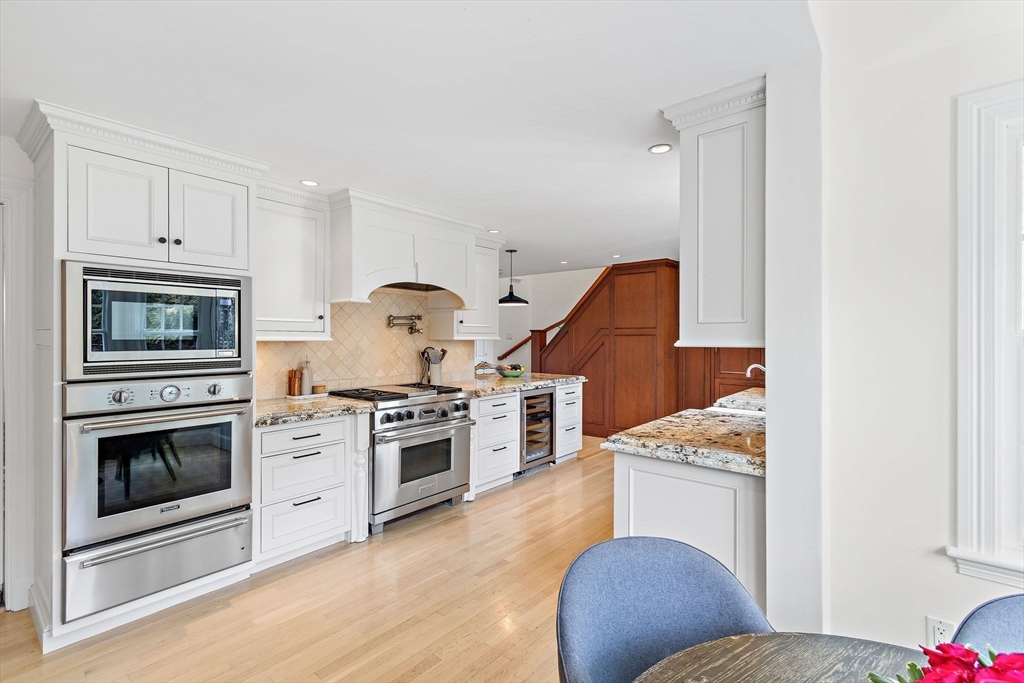 32 Pickwick Road Newton, MA 02465 - Photo 14 of 42 a kitchen with a stove oven and a refrigerator