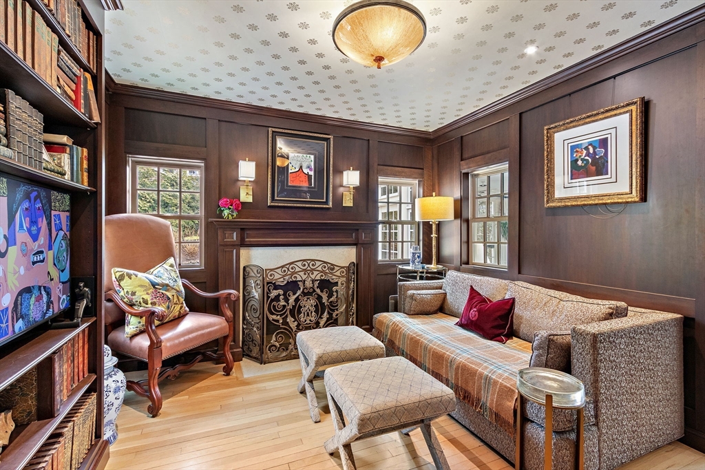 32 Pickwick Road Newton, MA 02465 - Photo 17 of 42 a living room with furniture and a fireplace