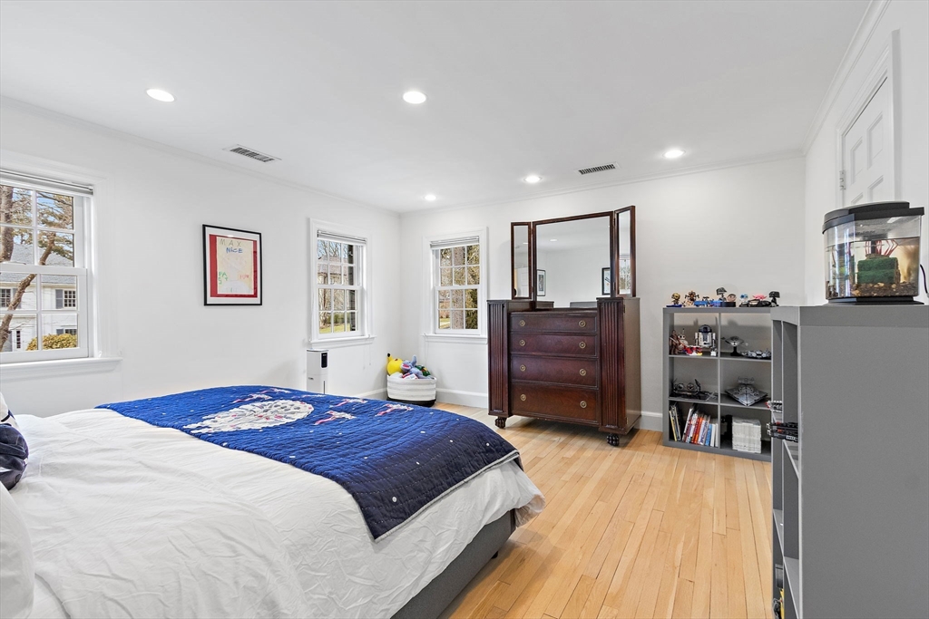 32 Pickwick Road Newton, MA 02465 - Photo 26 of 42 a bedroom with a bed and a dresser
