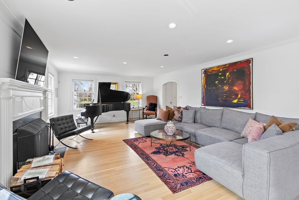 32 Pickwick Road Newton, MA 02465 - Photo 9 of 42 a living room with furniture and a flat screen tv