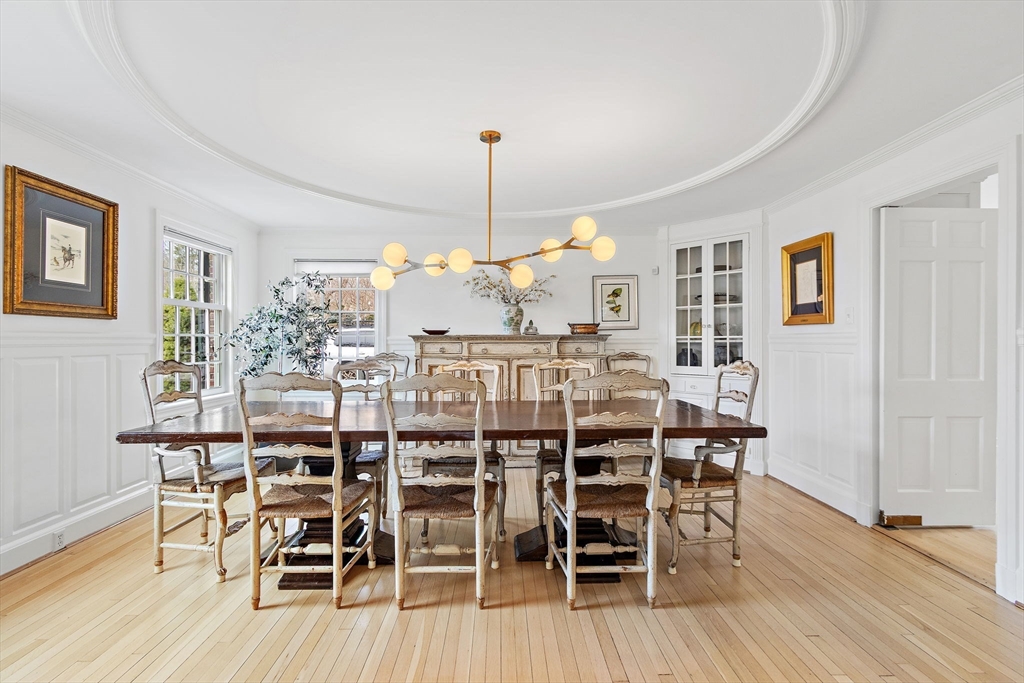 32 Pickwick Road Newton, MA 02465 - Photo 10 of 42 a view of a dining room with furniture and wooden floor