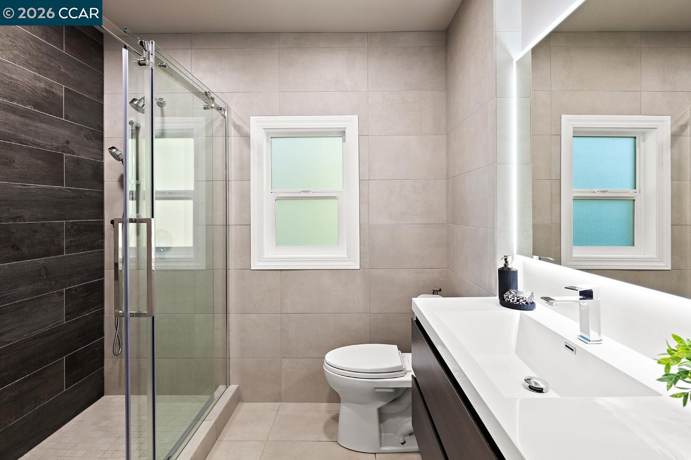 85 Ardmore Road Kensington, CA 94707 - Photo 39 of 45 a bathroom with a sink toilet and shower