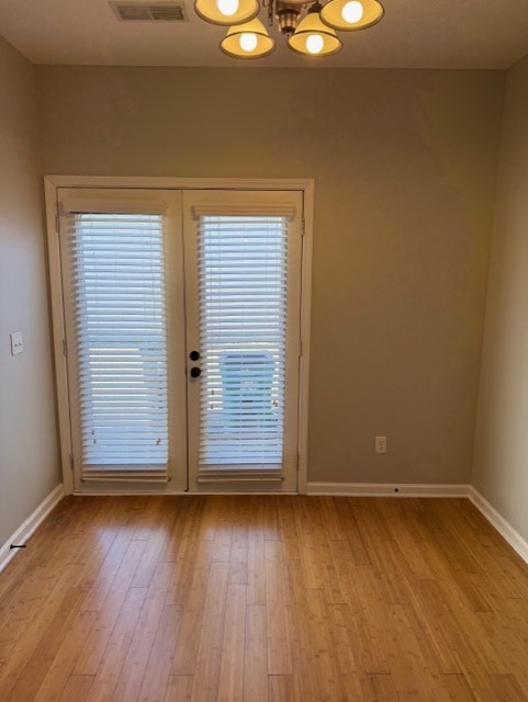1110 Ransom Way Nashville, TN 37217 - Photo 12 of 26 an empty room with wooden floor and windows
