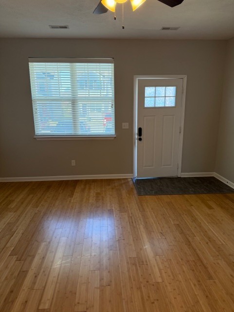 1110 Ransom Way Nashville, TN 37217 - Photo 4 of 26 an empty room with wooden floor and windows