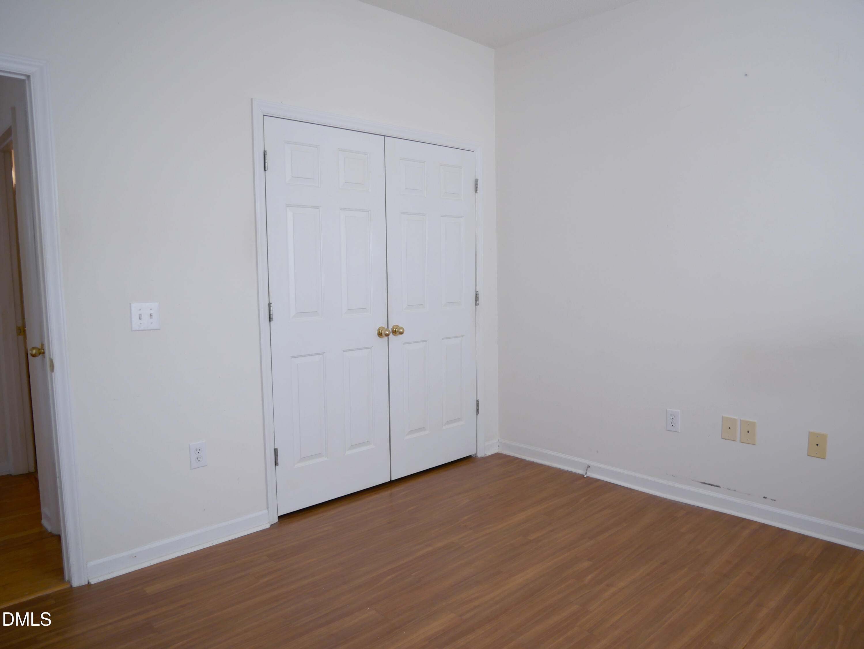4400 Cottage Stone Drive Raleigh, NC 27616 - Photo 11 of 19 a view of an empty room with wooden floor