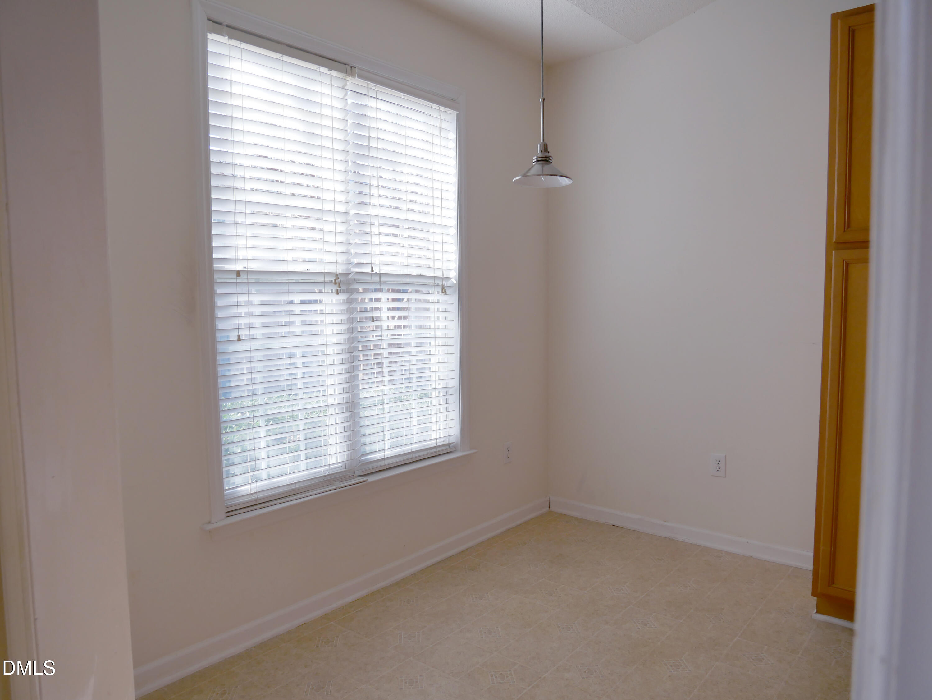 4400 Cottage Stone Drive Raleigh, NC 27616 - Photo 13 of 19 a view of an empty room with a window