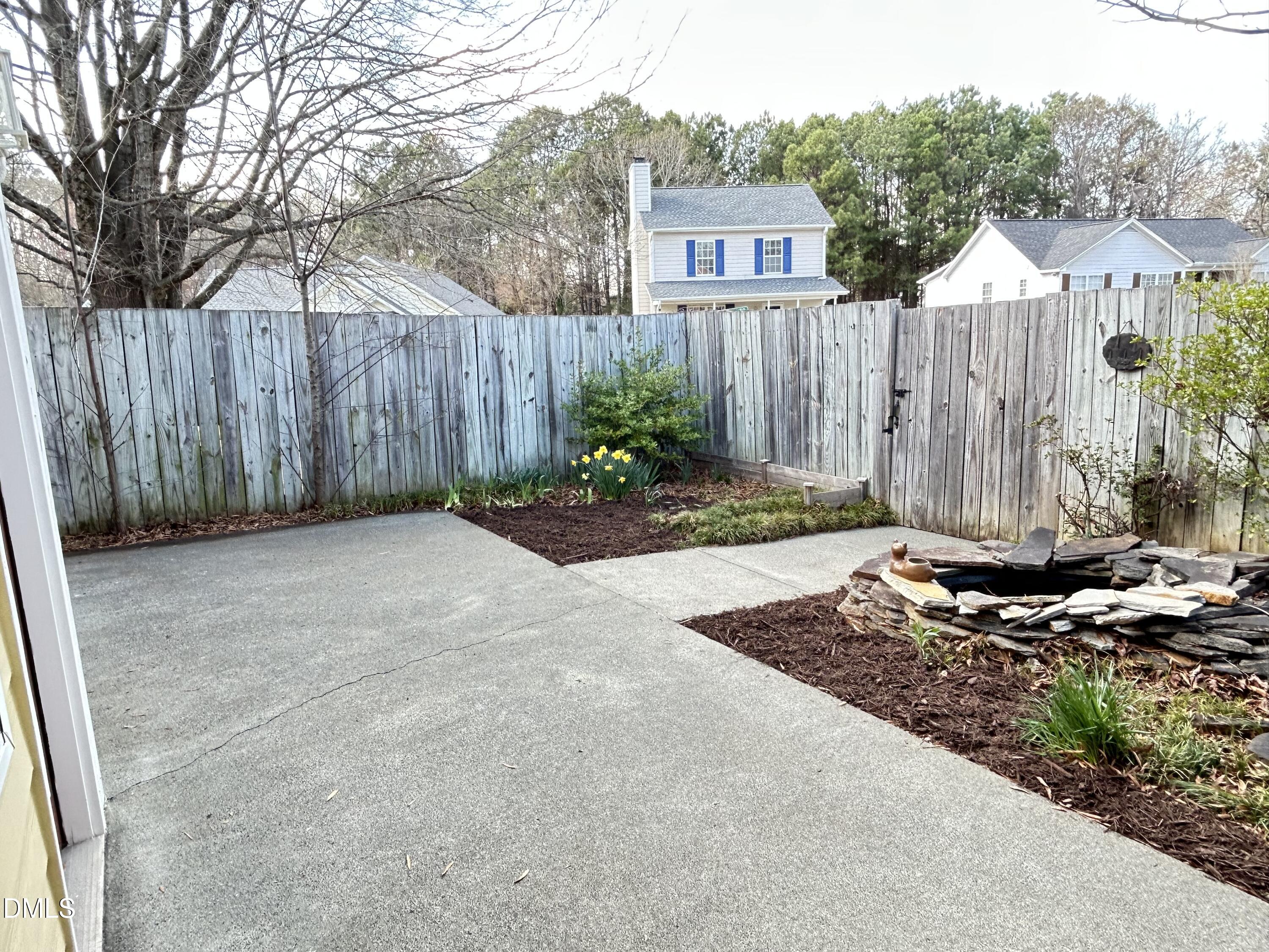 4400 Cottage Stone Drive Raleigh, NC 27616 - Photo 19 of 19 a front view of a house with a garden