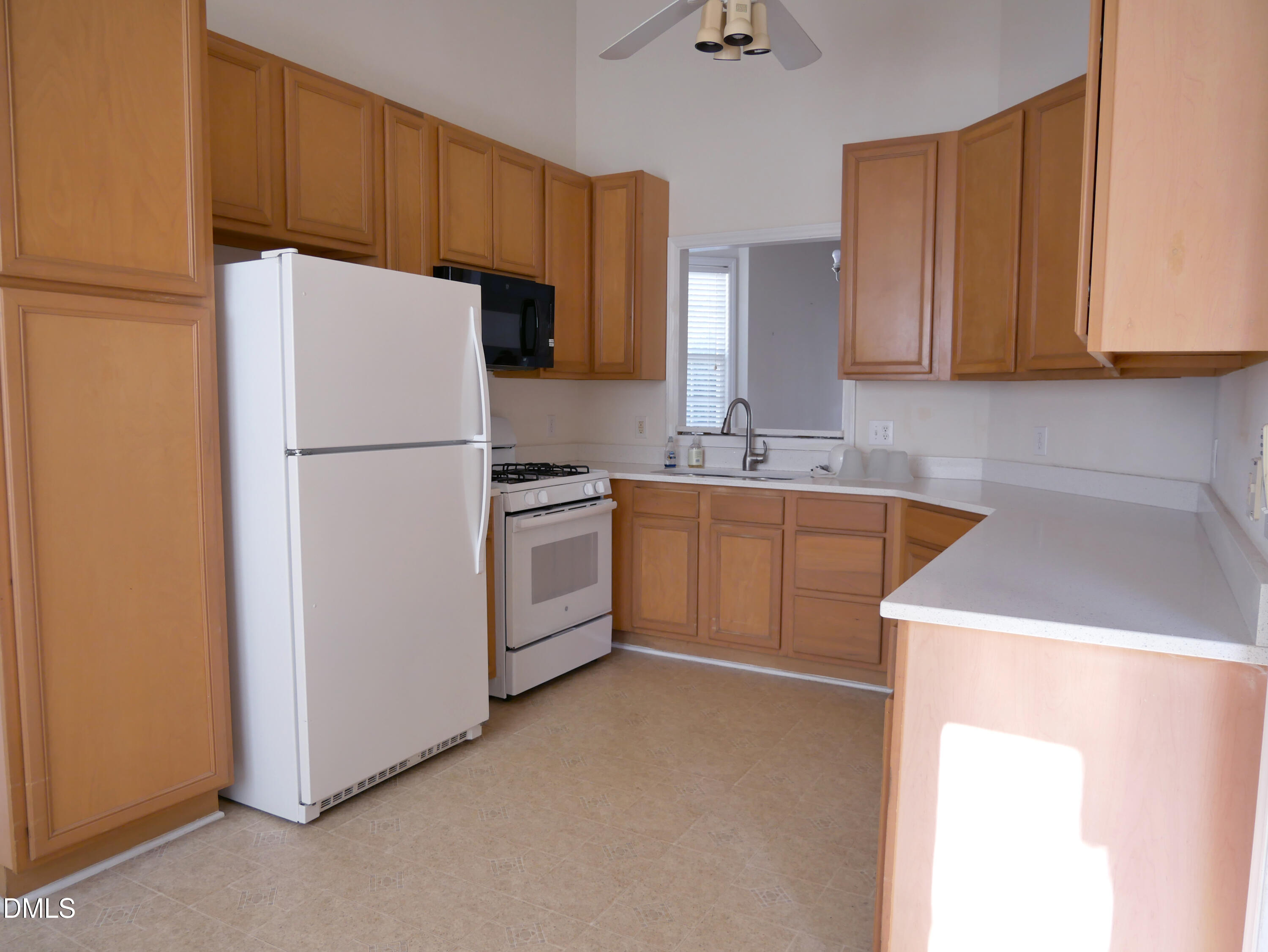 4400 Cottage Stone Drive Raleigh, NC 27616 - Photo 6 of 19 a utility room with cabinets washer and dryer