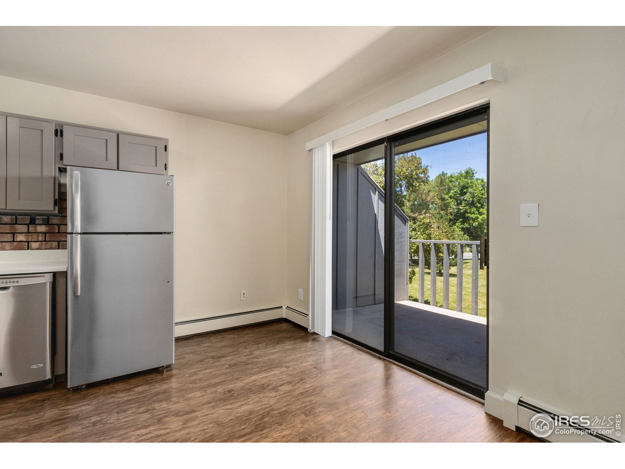 705 East Drake Road, Unit M 46 Fort Collins, CO 80525 - Photo 15 of 27 a kitchen with stainless steel appliances a refrigerator and a sink