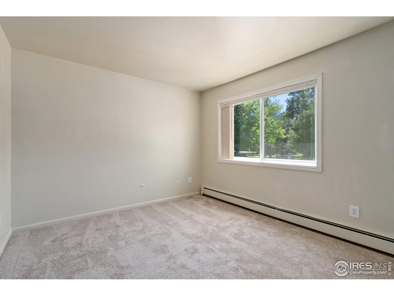 705 East Drake Road, Unit M 46 Fort Collins, CO 80525 - Photo 18 of 27 an empty room with windows