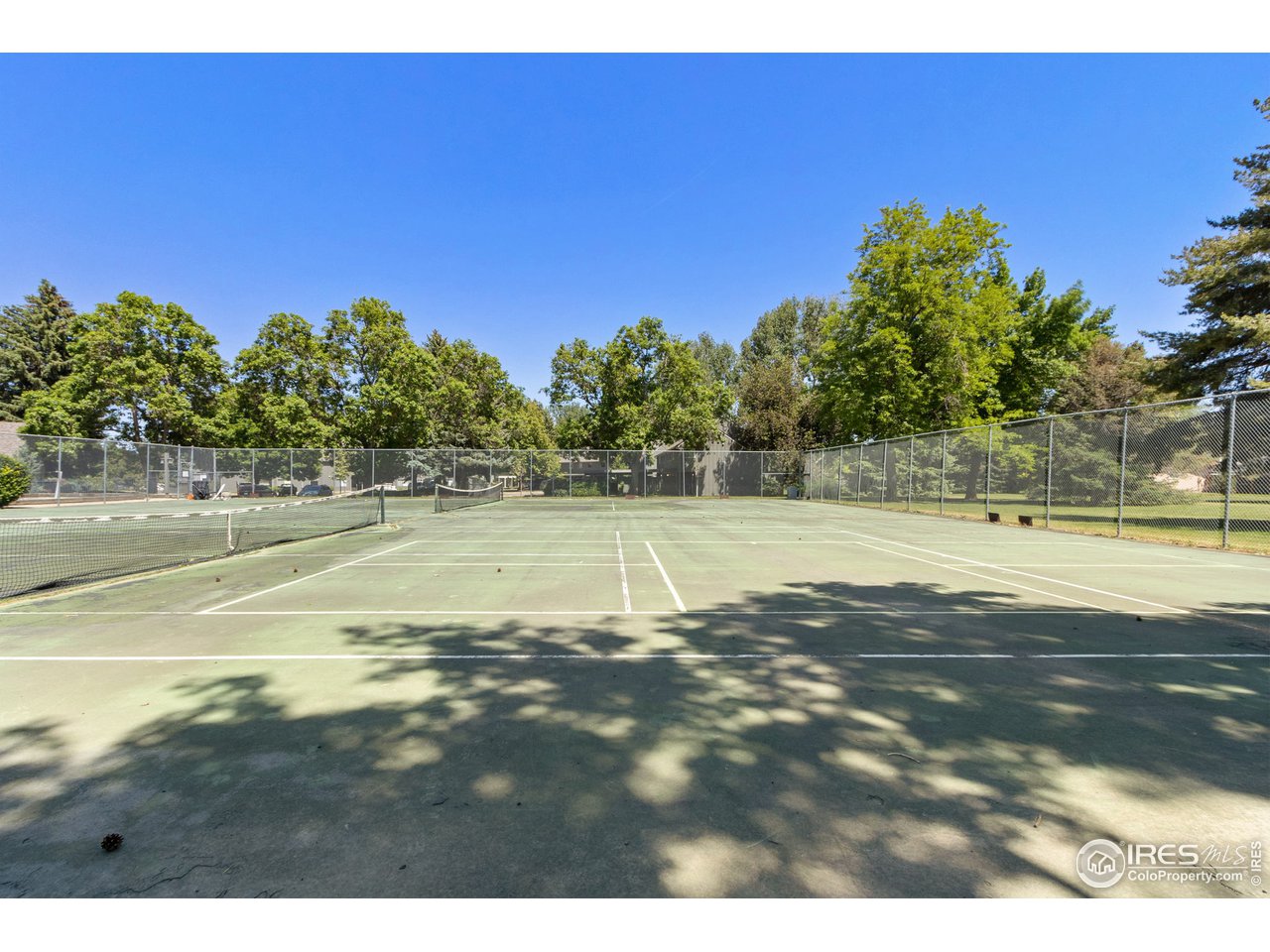 705 East Drake Road, Unit M 46 Fort Collins, CO 80525 - Photo 27 of 27 a view of a tennis court