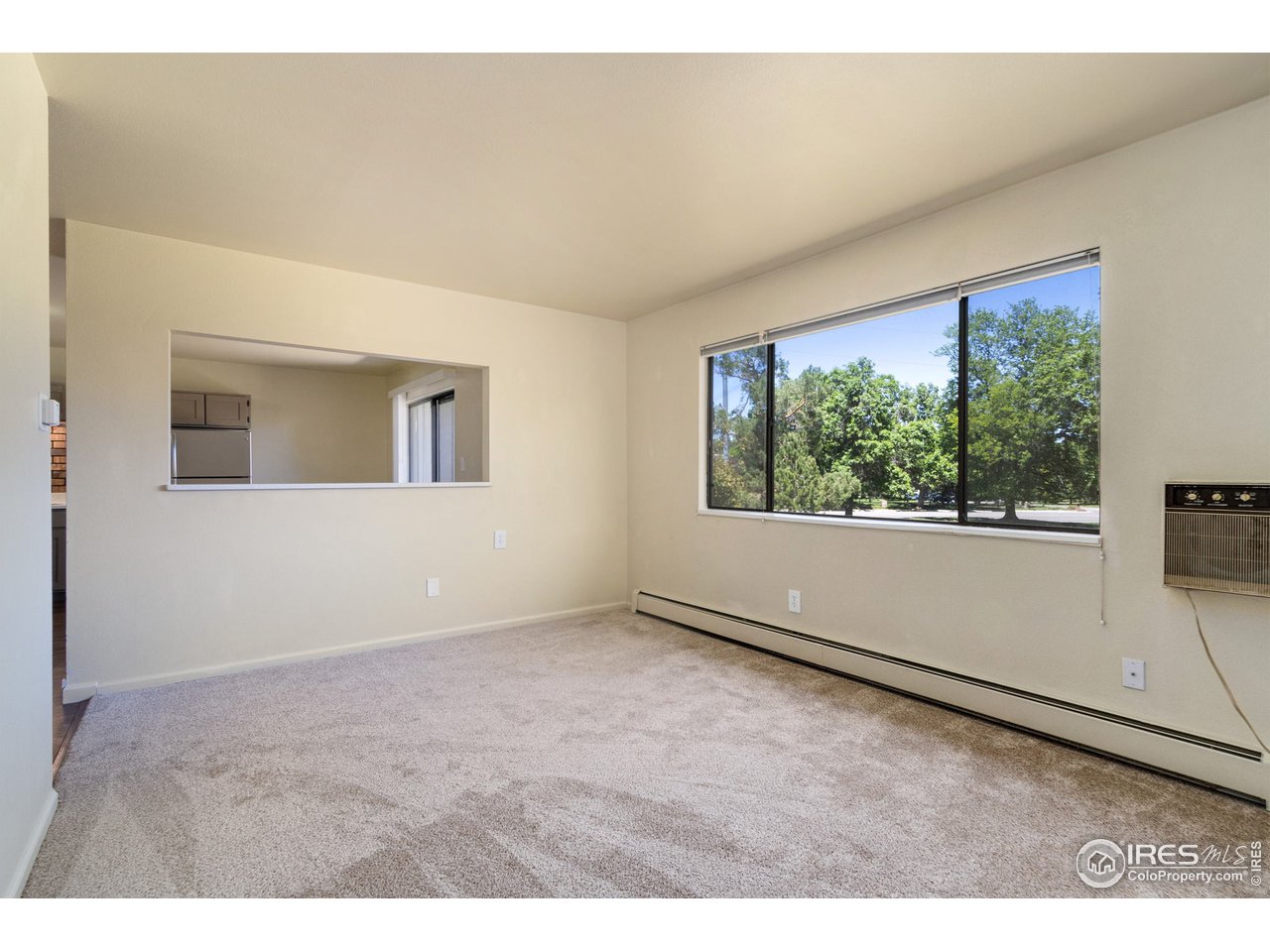 705 East Drake Road, Unit M 46 Fort Collins, CO 80525 - Photo 7 of 27 a view of an empty room with a window