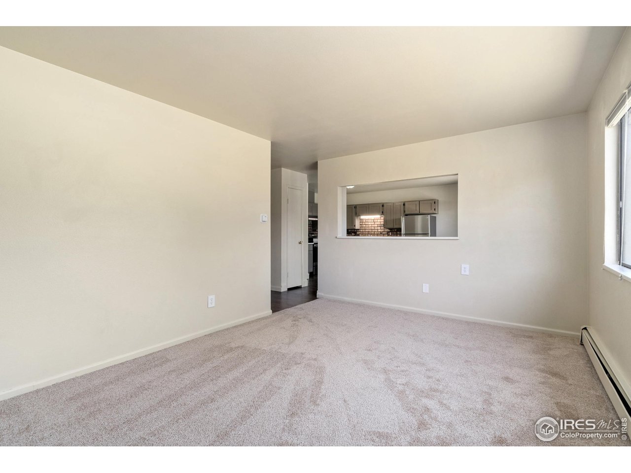 705 East Drake Road, Unit M 46 Fort Collins, CO 80525 - Photo 8 of 27 an empty room with a window
