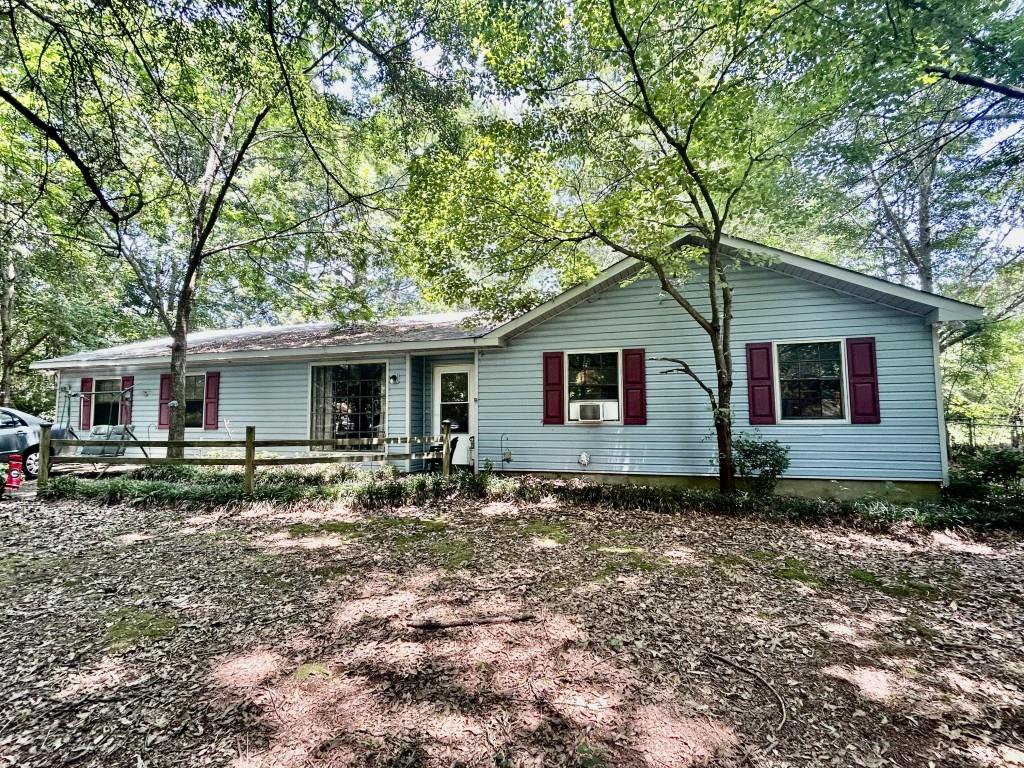 8324 Webb Road Riverdale, GA 30274 - Photo 1 of 1 a view of a house with a yard