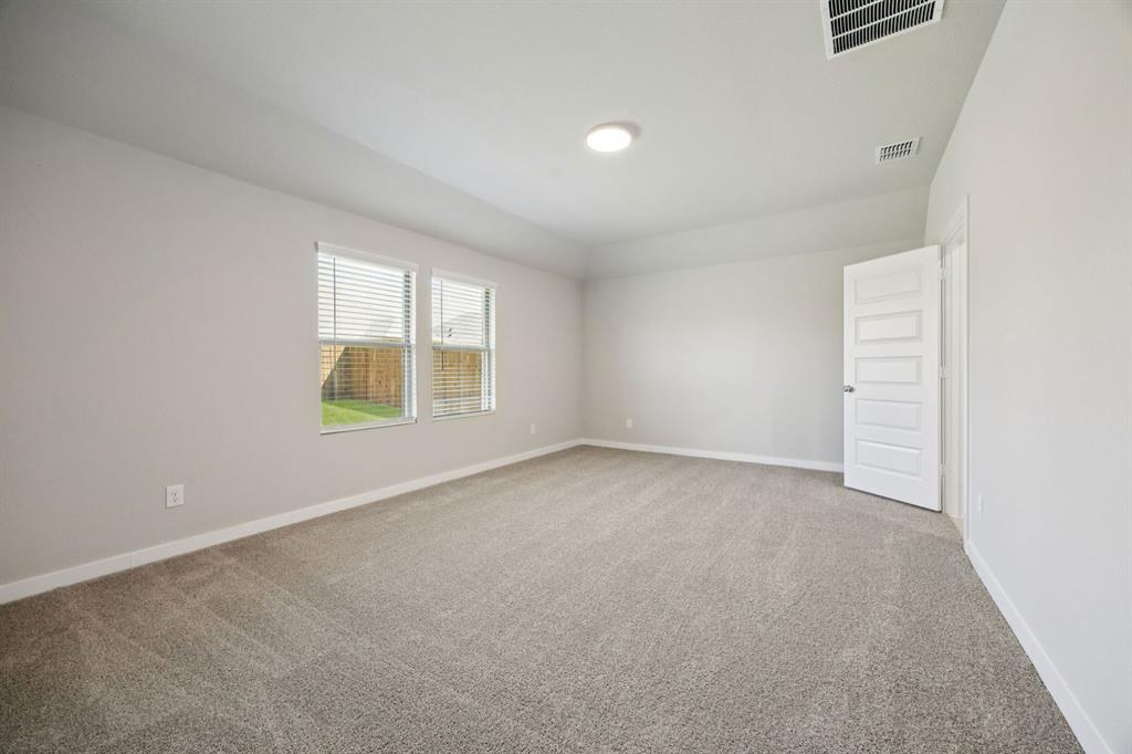 1195 Little Hls Way Lavon, TX 75166 - Photo 11 of 29 an empty room with windows
