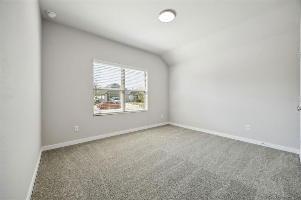 1195 Little Hls Way Lavon, TX 75166 - Photo 18 of 29 an empty room with windows
