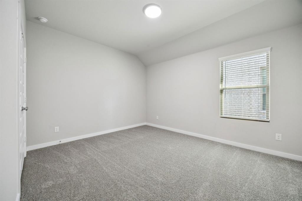 1195 Little Hls Way Lavon, TX 75166 - Photo 20 of 29 an empty room with a window
