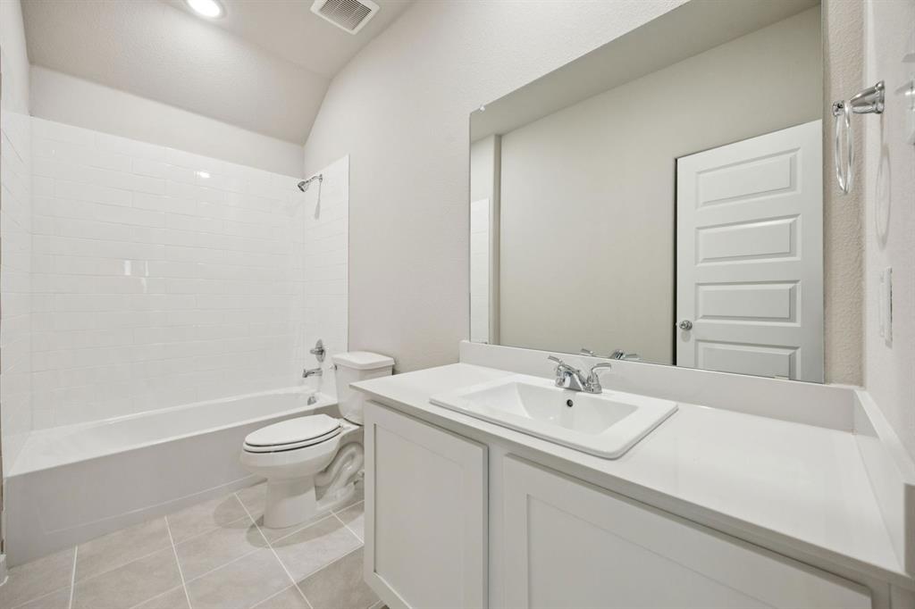 1195 Little Hls Way Lavon, TX 75166 - Photo 22 of 29 a bathroom with a sink a toilet and shower
