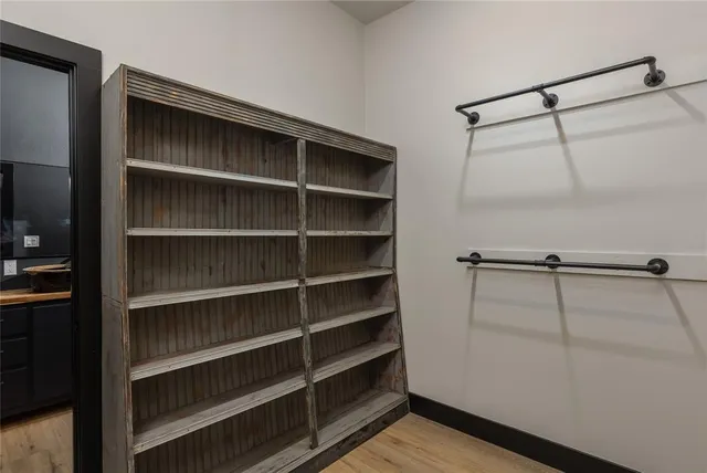 a view of a room with racks on the wall