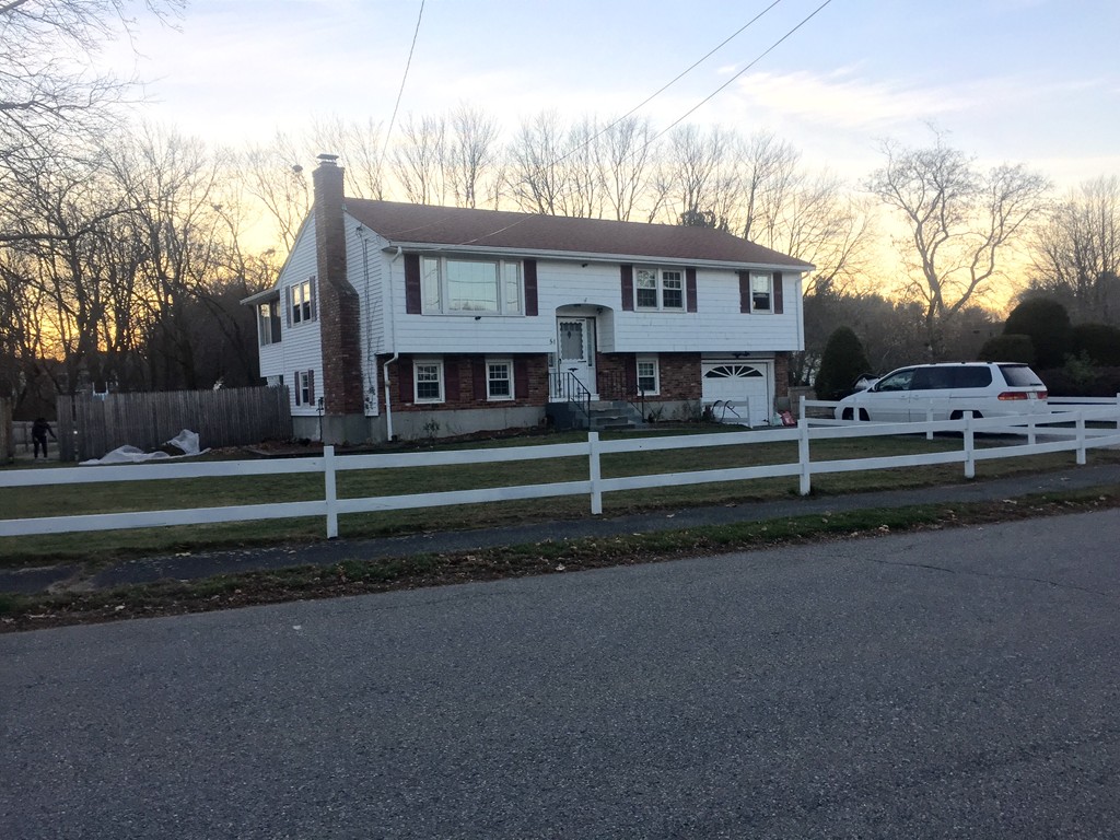 51 Appledor Road Framingham, MA 01701 - Photo 1 of 15 a view of a house next to a yard