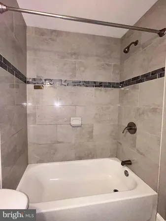 a view of a room with a fan