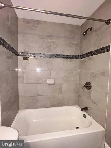 a view of a room with a fan