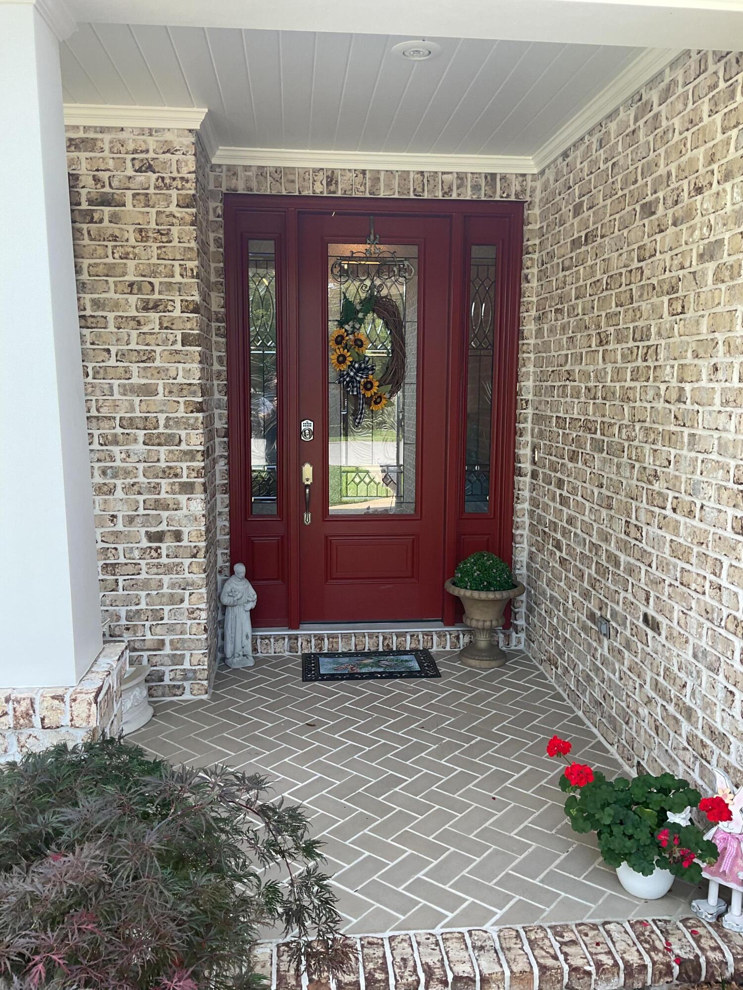 55 Derby Downs Circle Niceville, FL 32578 - Photo 11 of 34 a view of front door of house with yard
