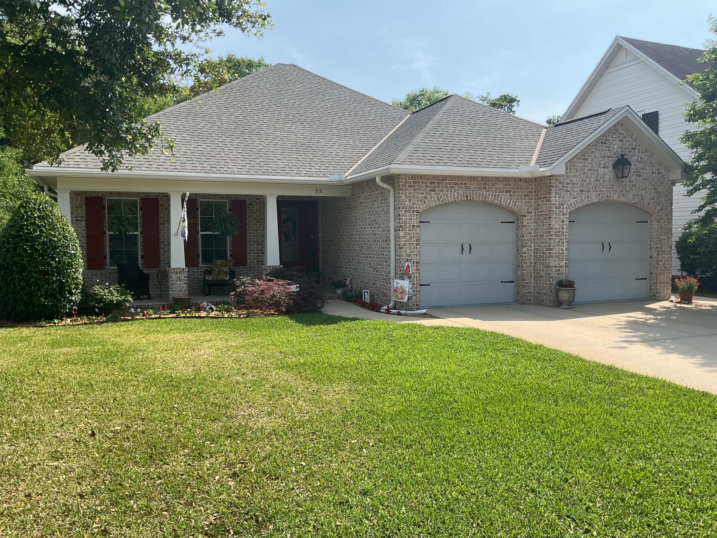 55 Derby Downs Circle Niceville, FL 32578 - Photo 2 of 34 a view of a house with garden and yard