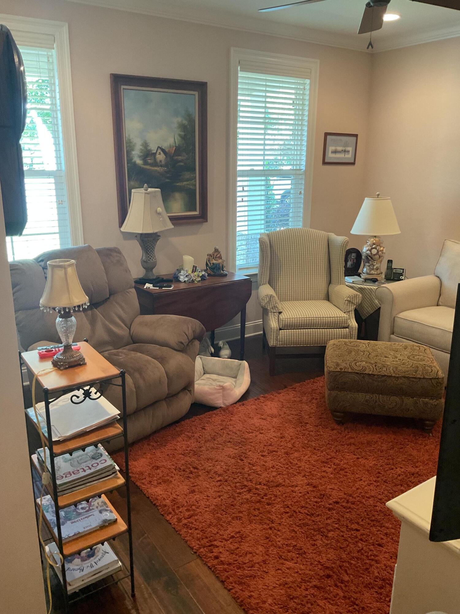 55 Derby Downs Circle Niceville, FL 32578 - Photo 23 of 34 a living room with furniture a window and a table