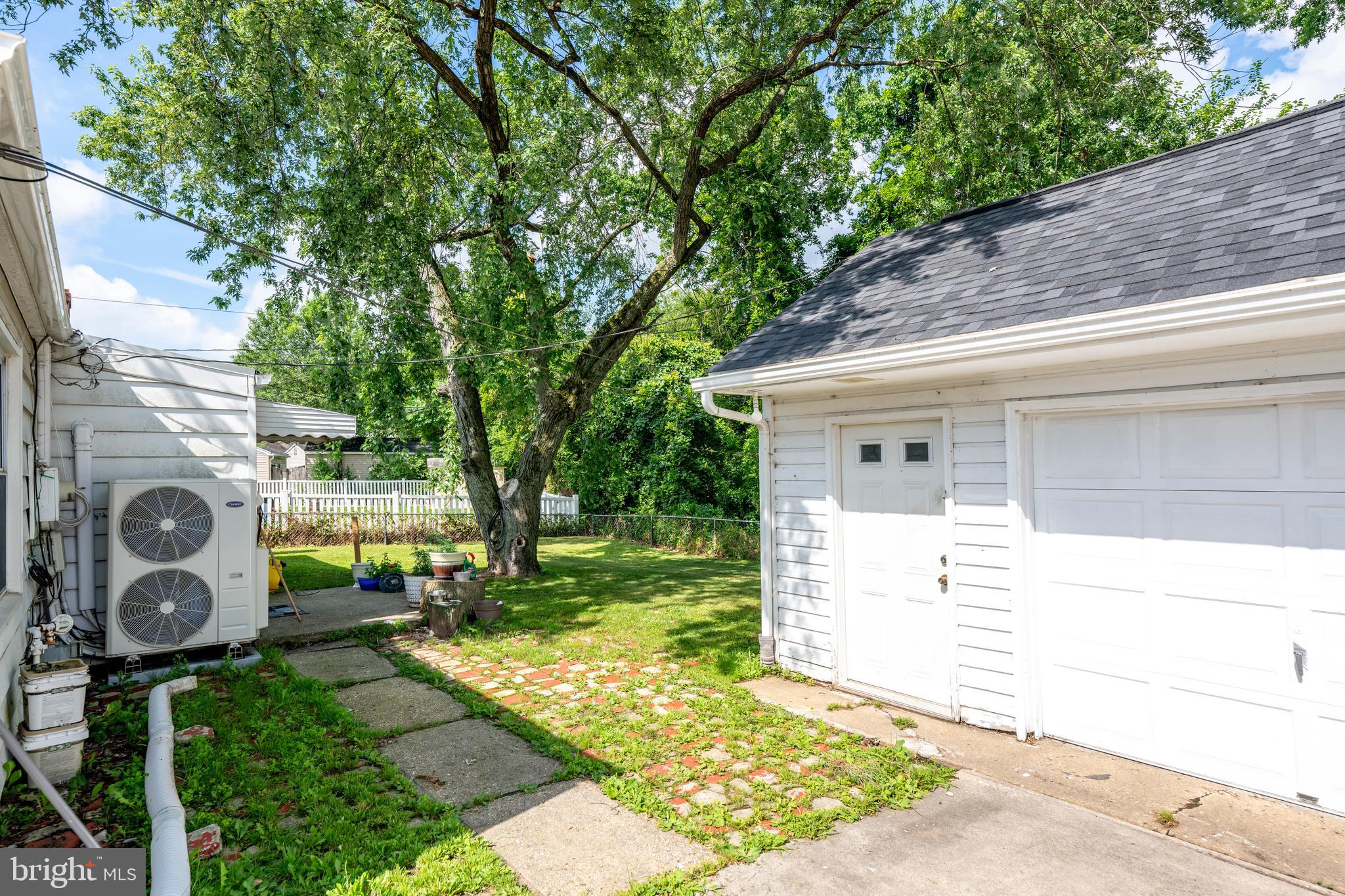7 Gainor Road New Castle, DE 19720 - Photo 20 of 26 a backyard of a house with seating space