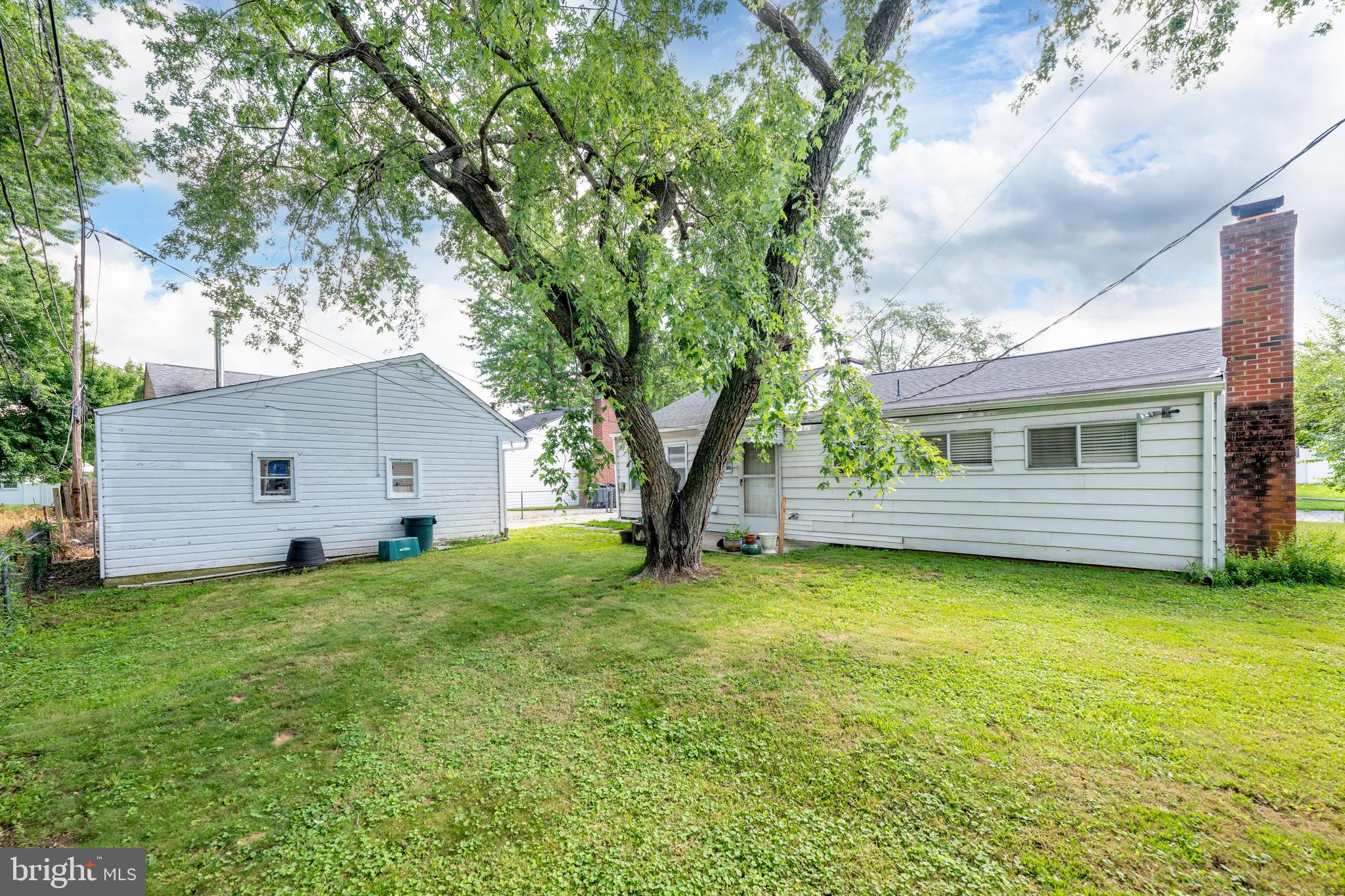 7 Gainor Road New Castle, DE 19720 - Photo 23 of 26 a view of a house with a yard