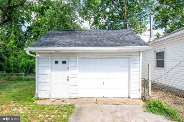a house view with a backyard space