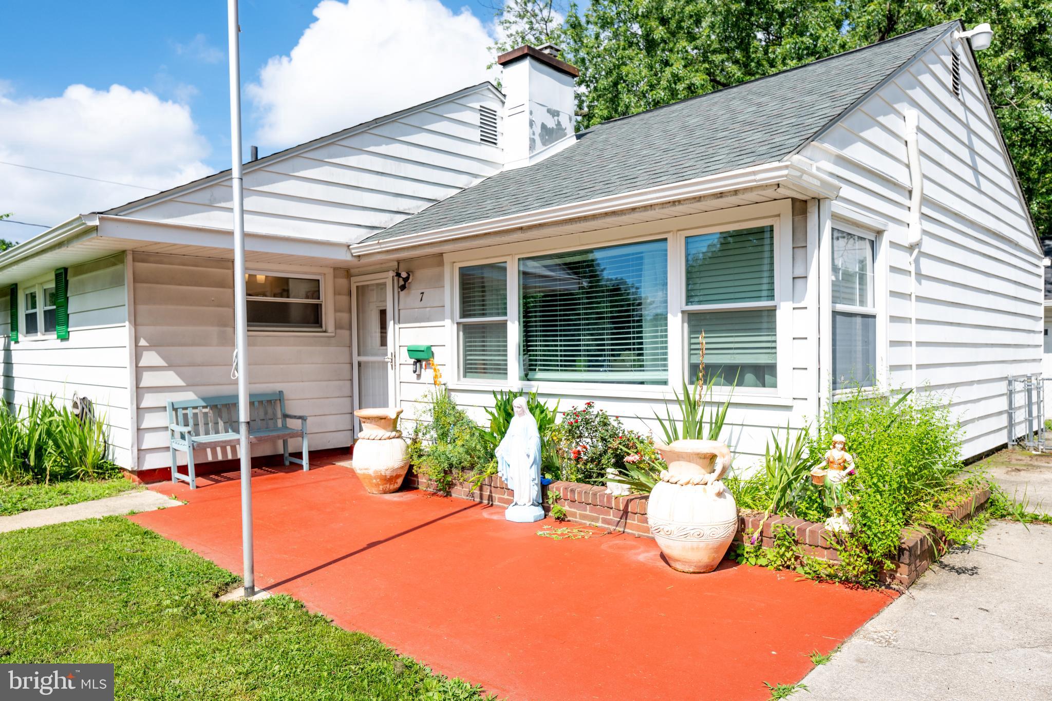 7 Gainor Road New Castle, DE 19720 - Photo 25 of 26 a view of a house with sitting area and garden