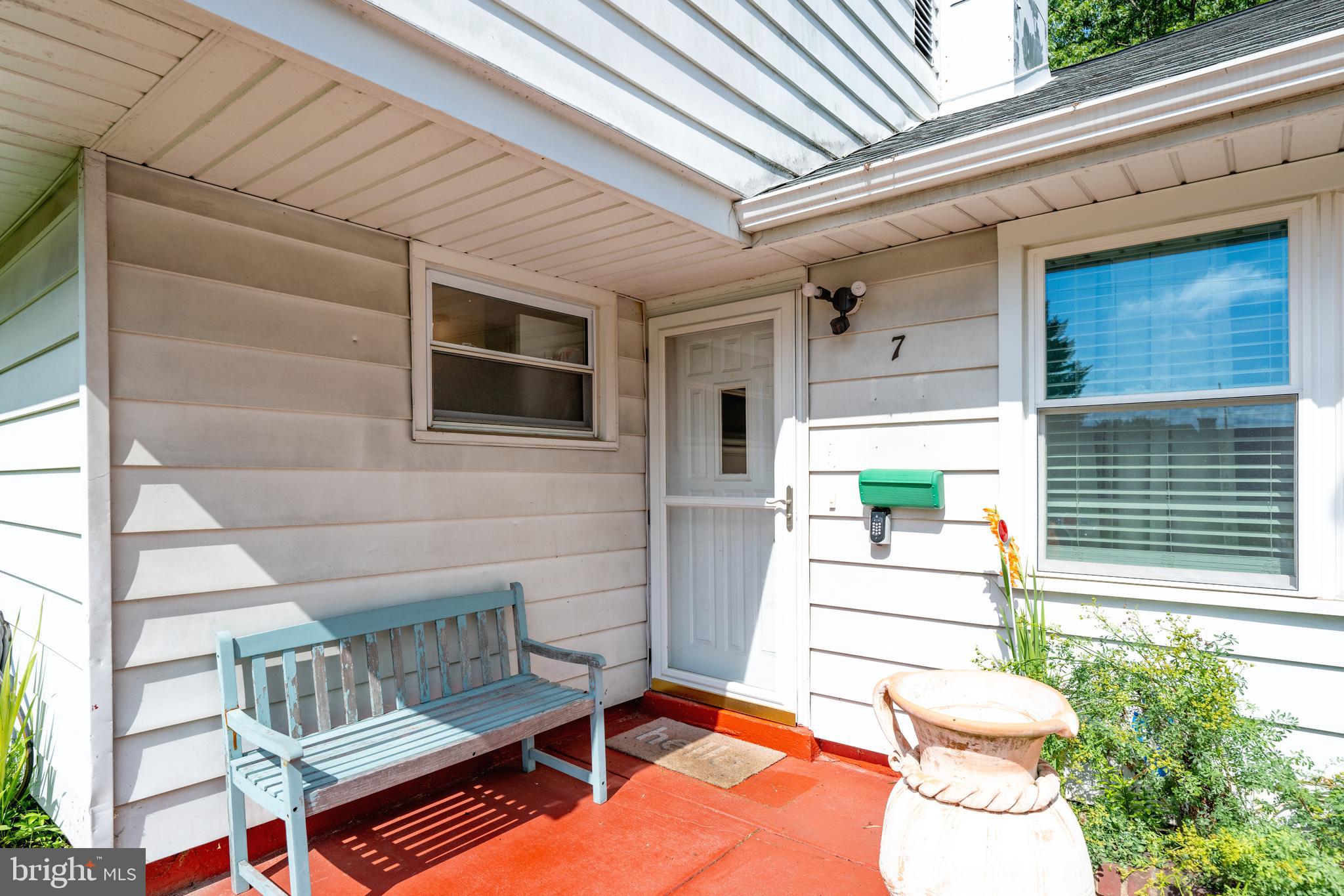 7 Gainor Road New Castle, DE 19720 - Photo 26 of 26 a front view of a house with a yard