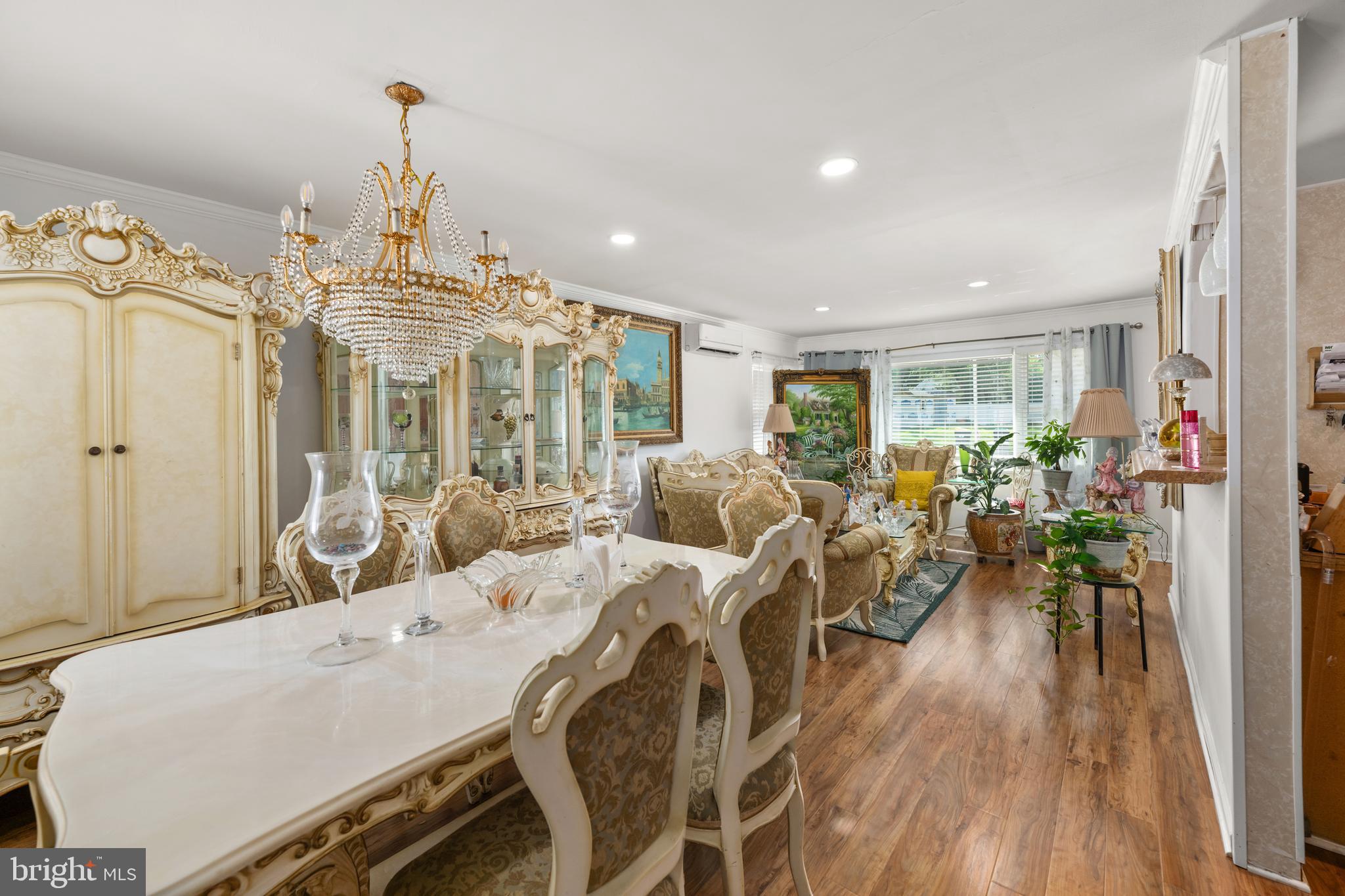 7 Gainor Road New Castle, DE 19720 - Photo 10 of 26 a view of a dining room with furniture window and wooden floor
