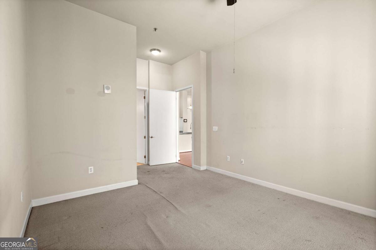 711 Cosmopolitan Drive Northeast, Unit 442 Atlanta, GA 30324 - Photo 11 of 32 a view of an empty room