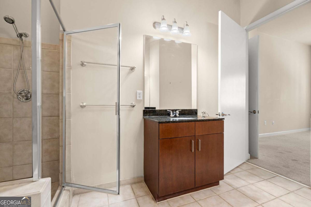 711 Cosmopolitan Drive Northeast, Unit 442 Atlanta, GA 30324 - Photo 14 of 32 a room view with hallway