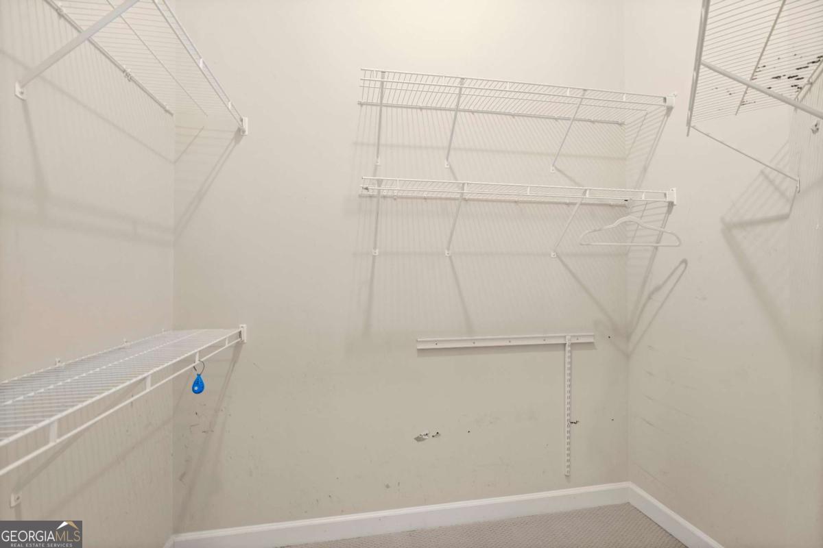 711 Cosmopolitan Drive Northeast, Unit 442 Atlanta, GA 30324 - Photo 16 of 32 a view of a closet