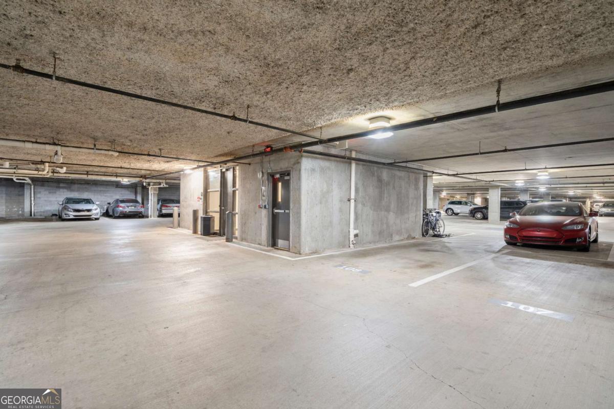 711 Cosmopolitan Drive Northeast, Unit 442 Atlanta, GA 30324 - Photo 25 of 32 a view of parking area