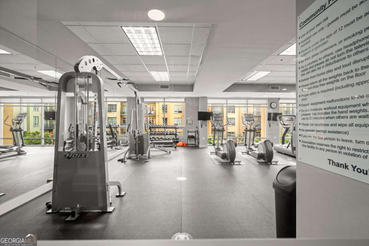 711 Cosmopolitan Drive Northeast, Unit 442 Atlanta, GA 30324 - Photo 29 of 32 a view of a room with gym equipment