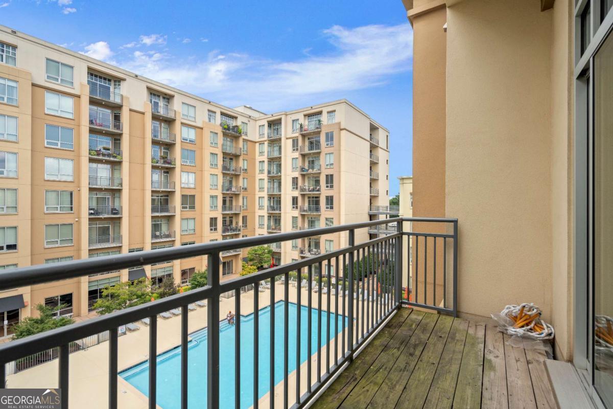 711 Cosmopolitan Drive Northeast, Unit 442 Atlanta, GA 30324 - Photo 5 of 32 a view of balcony with wooden floor