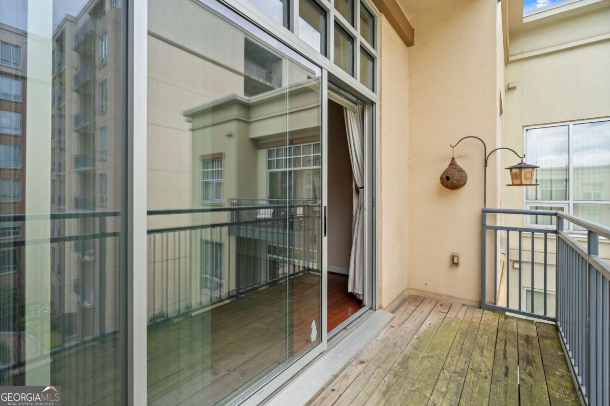 711 Cosmopolitan Drive Northeast, Unit 442 Atlanta, GA 30324 - Photo 6 of 32 a view of balcony with wooden floor