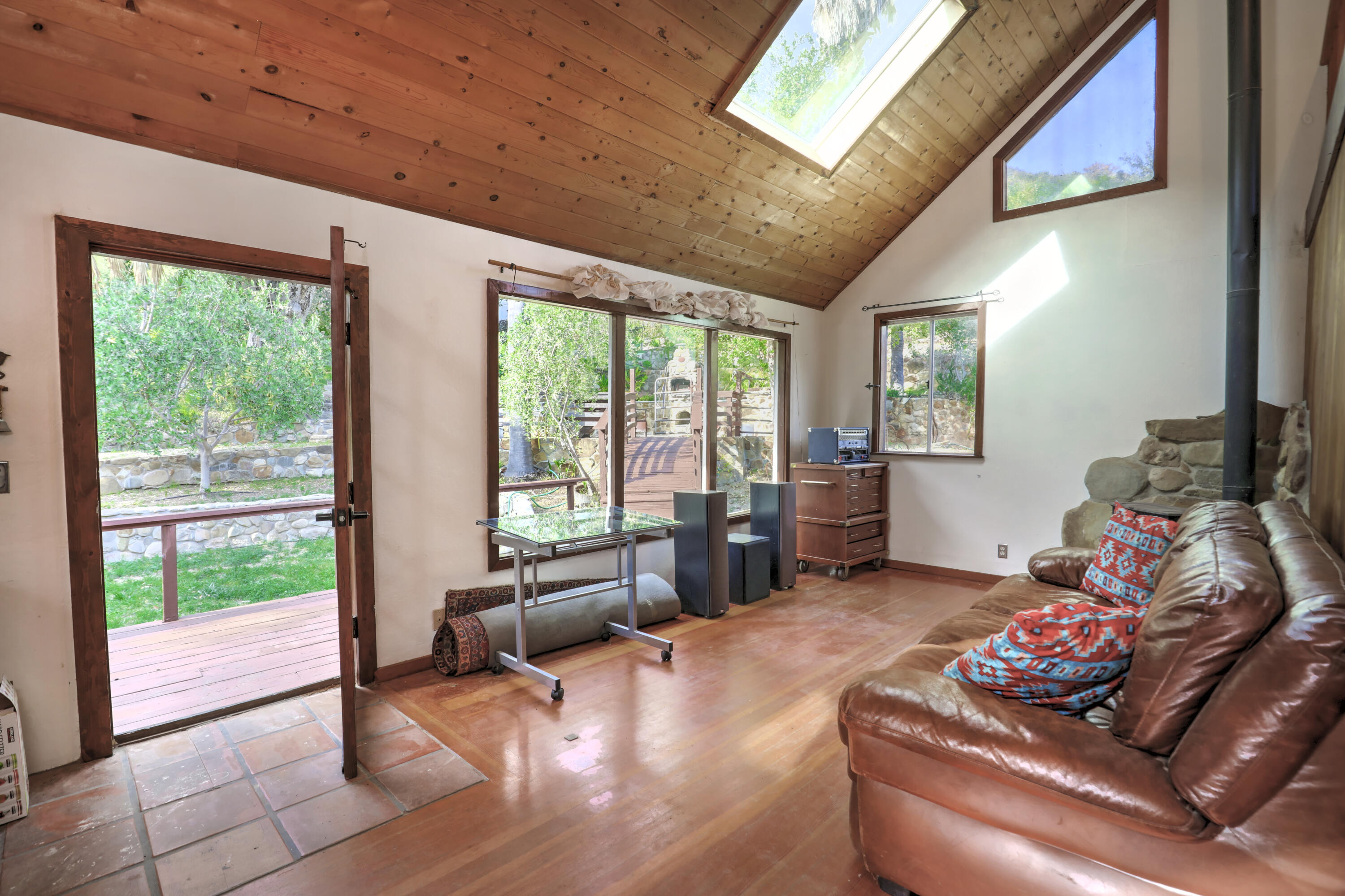 101 Hollister Ranch Road Goleta, CA 93117 - Photo 3 of 13 a living room with furniture and floor to ceiling windows