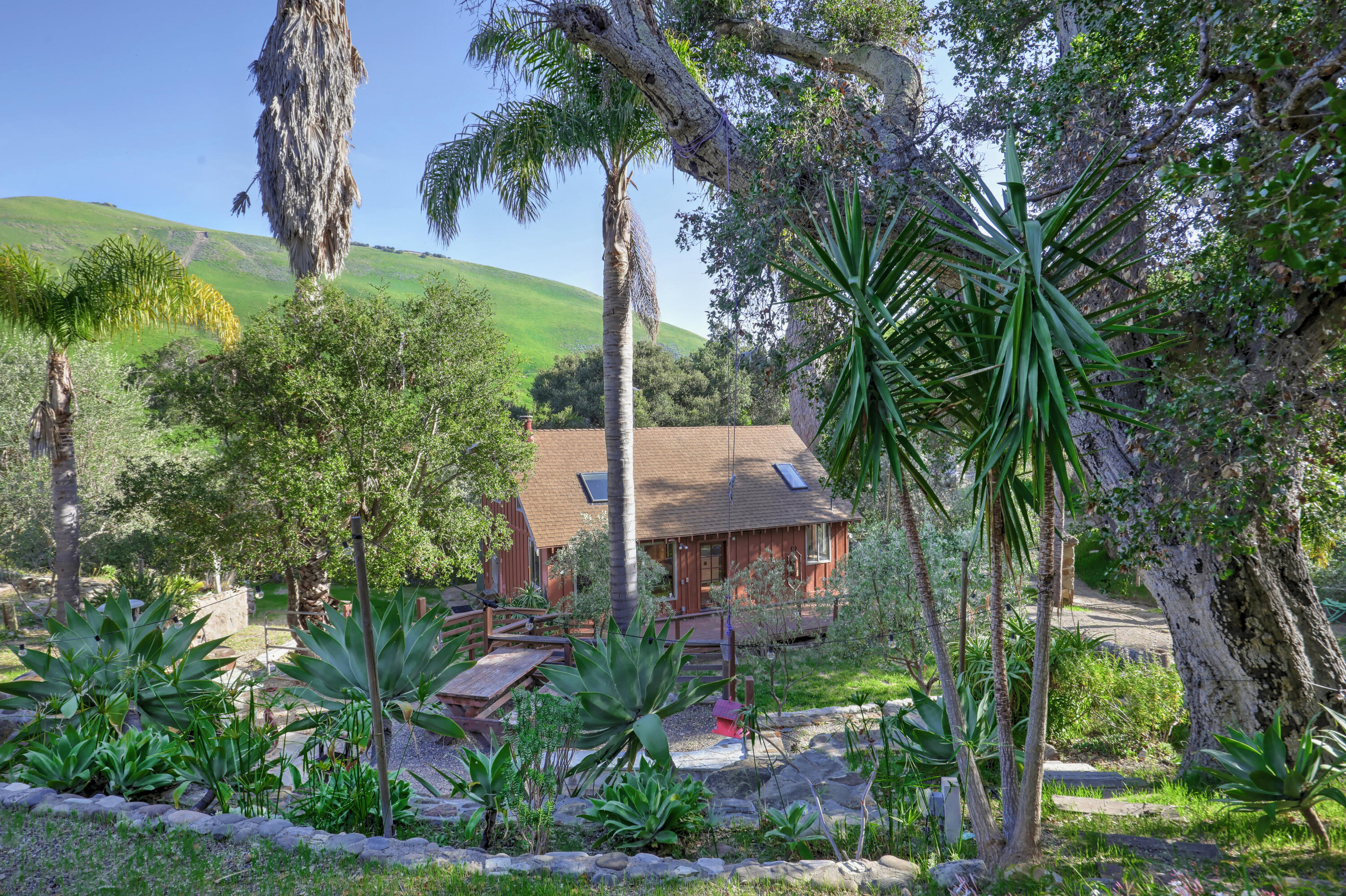 101 Hollister Ranch Road Goleta, CA 93117 - Photo 9 of 13 an aerial view of a house with garden space and trees