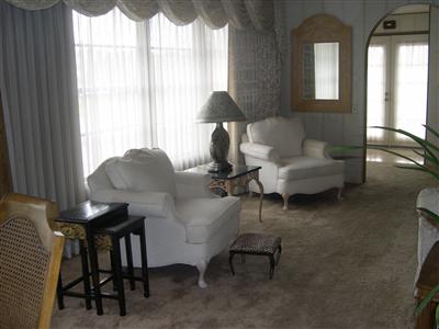 1945 Piner Road, Unit 145 Santa Rosa, CA 95403 - Photo 5 of 11 a living room with furniture and a large window