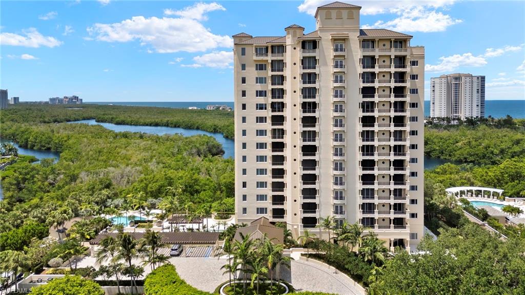 8990 Bay Colony Drive, Unit 1002 Naples, FL 34108 - Photo 20 of 20 a view of a city with tall buildings