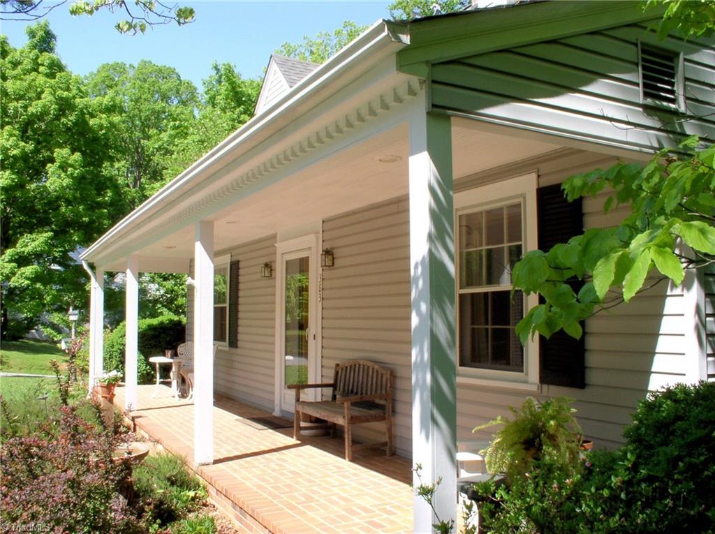 383 Hawthorne Road Elkin, NC 28621 - Photo 2 of 30 Quaint covered front porch with views toward Hawthorne Road.