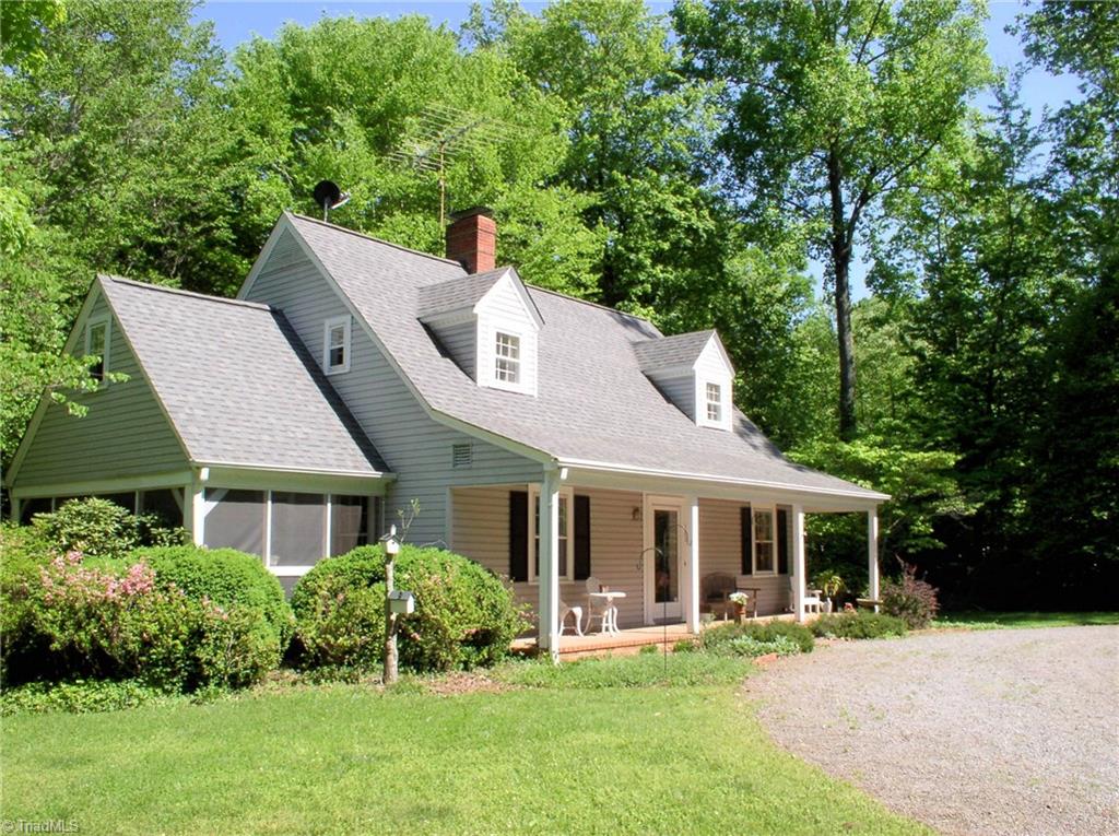 383 Hawthorne Road Elkin, NC 28621 - Photo 3 of 30 Home features private screened porch and mature landscaping.