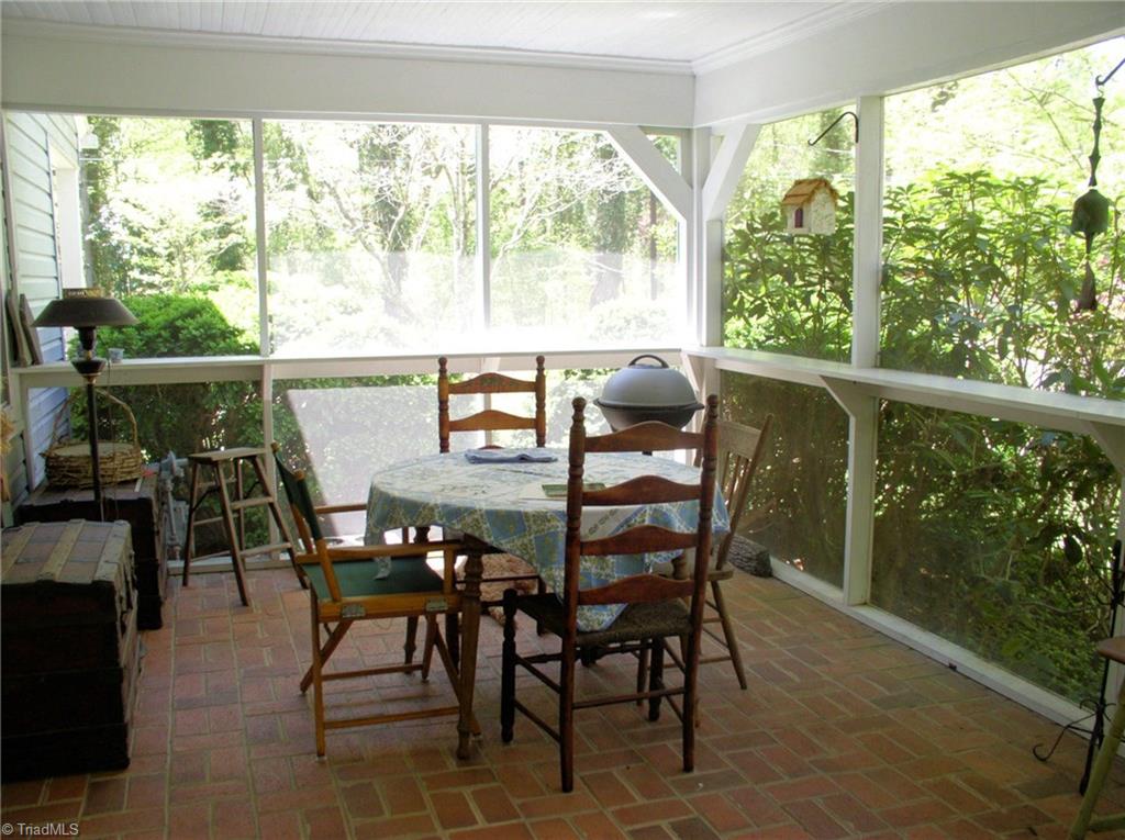 383 Hawthorne Road Elkin, NC 28621 - Photo 24 of 30 Private screened porch is located off the living room.